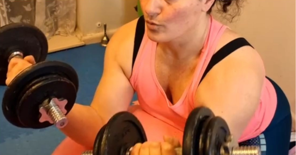 Me lifting heavy weights to help me reverse aging